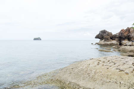 Rocky beach by the sea. Small stones on the sea.の写真素材