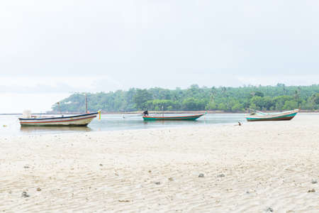 Many fishing boats Parking on the sea beach.のeditorial素材