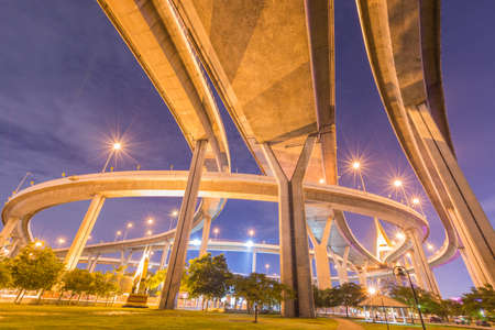 Light from the park area under Bhumibol Bridge.