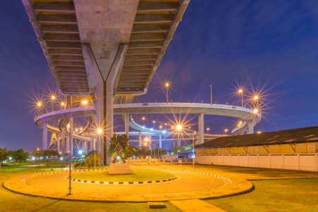 Light from the park area under Bhumibol Bridge.