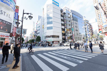 TOKYO,JAPAN - NOVEMBER 18,2016: people are waiting across the street in Shibuya.