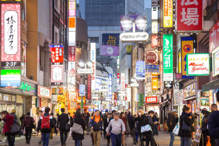 TOKYO,JAPAN-NOVEMBER 16,2016:Shibuya Street and shops Japanese and tourists in the economy and billboards.のeditorial素材