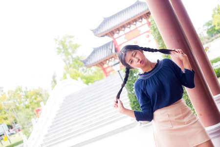 Portrait asian teen and smile relax in holiday. relax time. happy and smile.の写真素材