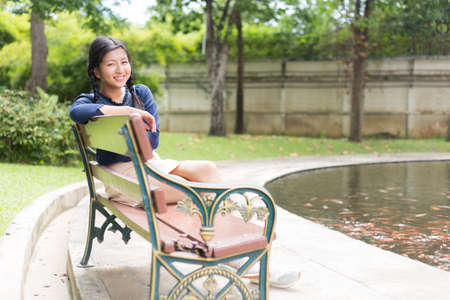 Portrait asian teen and smile relax in holiday. relax time. happy and smile.の写真素材