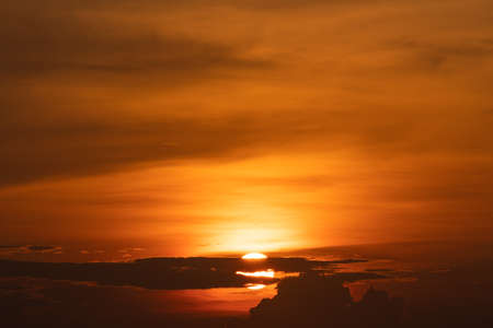 Sun in sunset. Cloudy in sunset summer.の写真素材