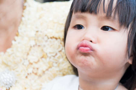 Asian child relax in holiday. Black hair happy and relax in holiday.の写真素材