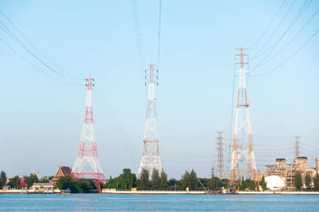 High voltage electricity poles in the evening Send electricity from the production plant.