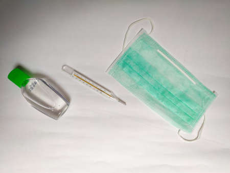 safety kit for protection sanitizer thermometer face mask from pollution , flu . virus , white background.の写真素材