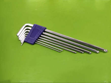 Allen keys set Hexahedron wrench on brown green background, hex, spannersの写真素材