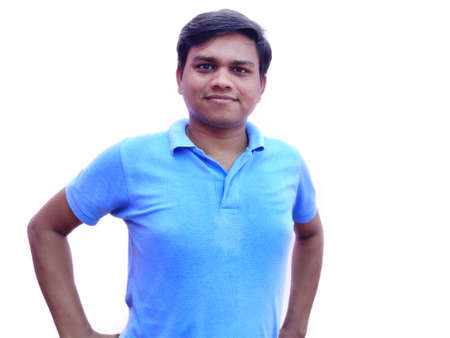 Young handsome confidant Man standing upright and smiling
