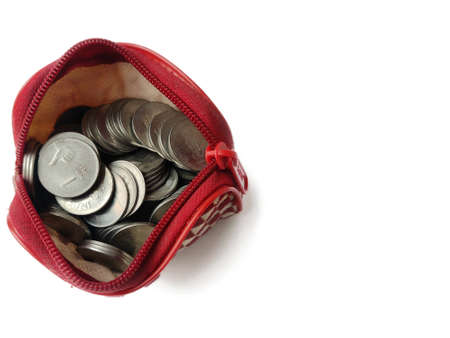 Coins in ladies purse on White backgroundの写真素材