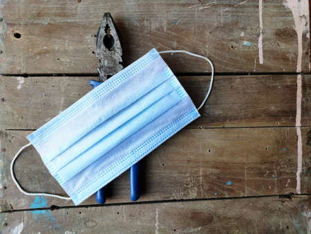 Face mask with Tools , safety at workplace from Covid , May day and Labour day Concept Space for...