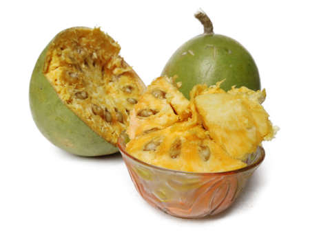 Aegle Marmelos is indian subcontinent fruit for medical use ion white background with pulp .の写真素材