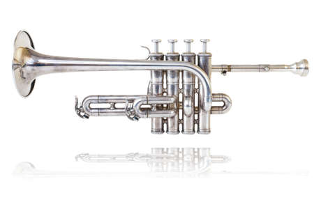 Silver golden piccolo trumpet four valves isolated background の写真素材
