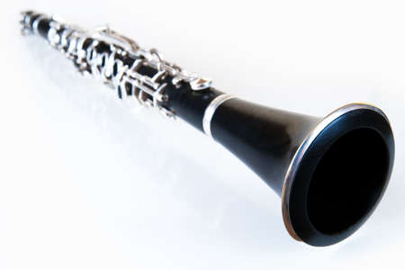 perspective of a black classic music clarinet with silver environmentの写真素材
