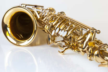 golden concert saxophone on white backgroundの写真素材