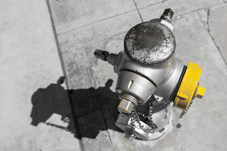 colorkey of an american fireplug hydrant standing at a pavementの写真素材