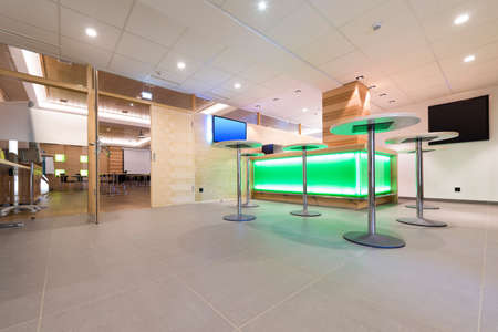 low view to wooden foyer with illuminated bar deskの写真素材