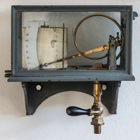 old retro hygrometer weather station at wallの写真素材