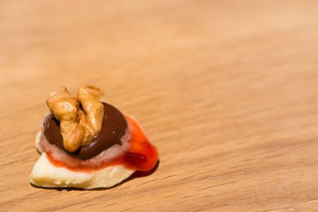 single christmas cooky on wooden table with jamの写真素材