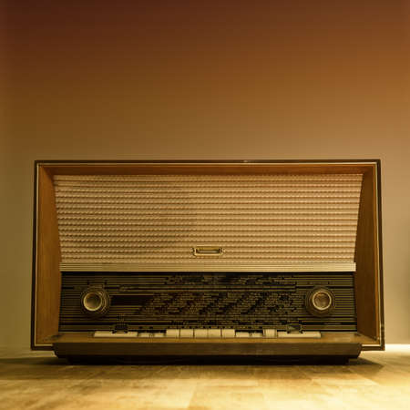 old wooden fm am radio with round adjusting knobsの写真素材