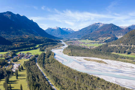 wonderful autumn fall view to lechtal river in austria alpsの写真素材