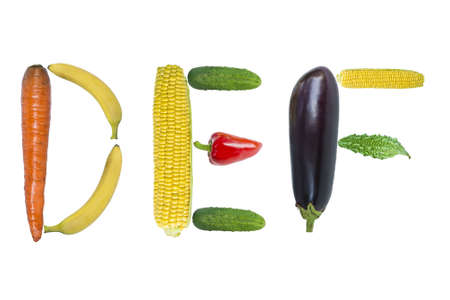 Letters DEF from fruits and vegetables isolated on whiteの写真素材