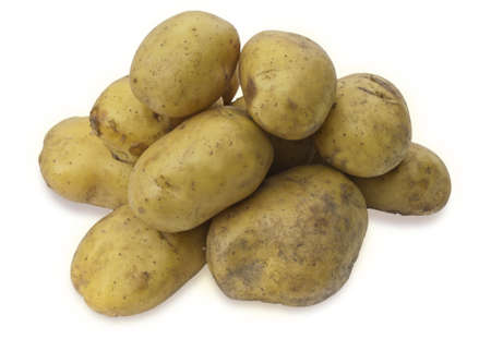 Raw potato isolated over whiteの写真素材