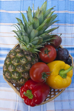 The group of fruits and vegetables on tableclothの写真素材