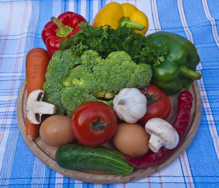 The group of fruits and vegetables on tableclothの写真素材