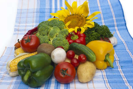 The group of fruits and vegetables on tableclothの写真素材