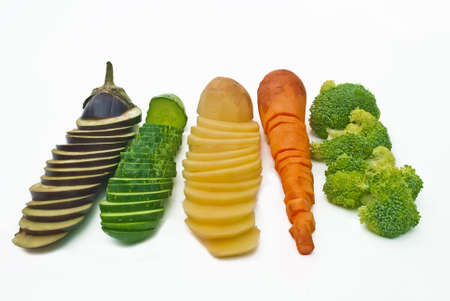 Five sliced vegetables isolted on whiteの写真素材
