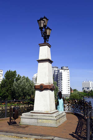 Kaliningrad, Russia, August 2, 2015. A girl stands on a bridge over the river Pregol.のeditorial素材