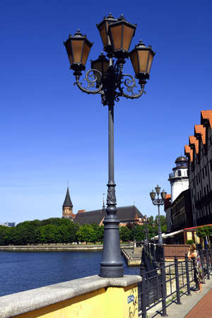 Kaliningrad, Russia, August 2, 2015, a Woman stands on the embankment of the river Pregelのeditorial素材