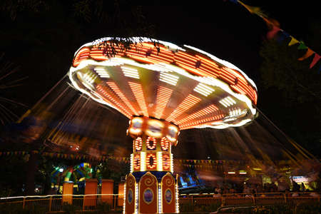 Sochi, Russia. 12 Aug 2016. Fair rides, night scene long exposure.のeditorial素材