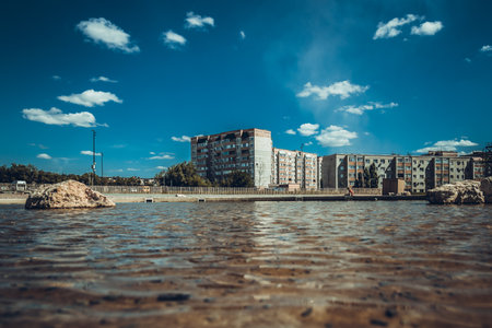 The surface of the pool and the blue sky above it in the city center. soft focusの写真素材