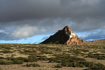 Tibetan monastery above holy Lake Manasowar near Mt. Kailash in Tibetの写真素材