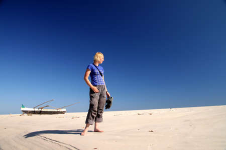 A girl relaxing on the beachの写真素材