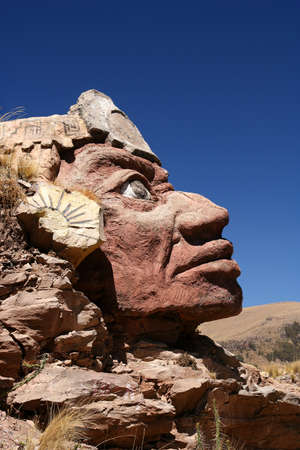Stone Inca face on the shore of Lake Titicaca in Peruのeditorial素材