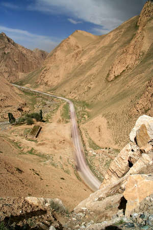 Twisting mountain road from Xinjang province in China to Western Tibetの写真素材