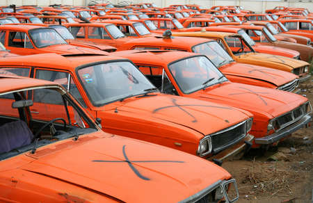 Cementary of disused and broken Paykans  Iranian national carsのeditorial素材