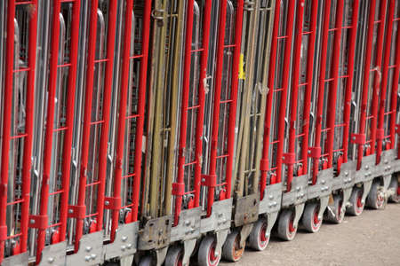 Big delivery trolleys outside supermarket in Brixton in Londonの写真素材