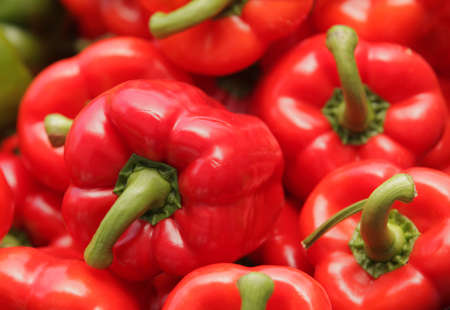 Red bell peppers on sale on a farmers market