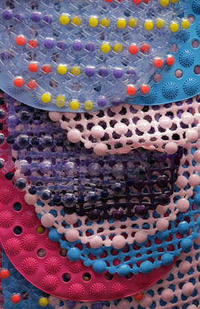 Colourful anti - slippery bath mats on sale on a marketの写真素材