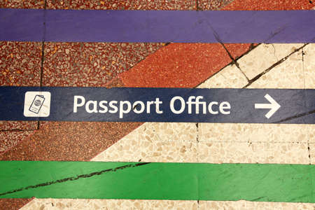Colourful lines directing passengers towards various points from the station such as  passport...