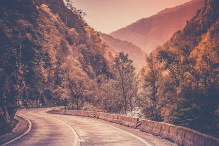 Empty mountain road through the Carpathian mountains, Romaniaの写真素材