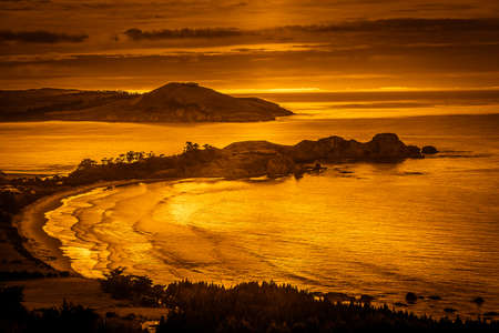 Beautiful coastline of New Zealand South Island during susnetの写真素材