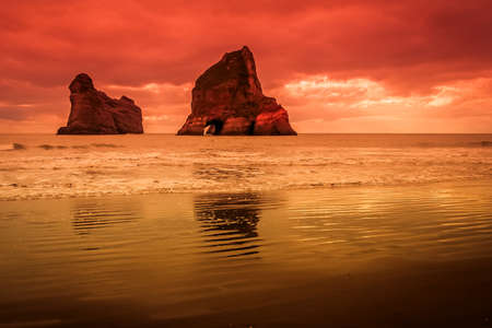 Archway Islands on the beach at Wharariki Beach near Nelson, New Zealandの写真素材