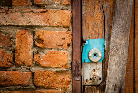 Old rusted lock on a shed in the gardenの写真素材