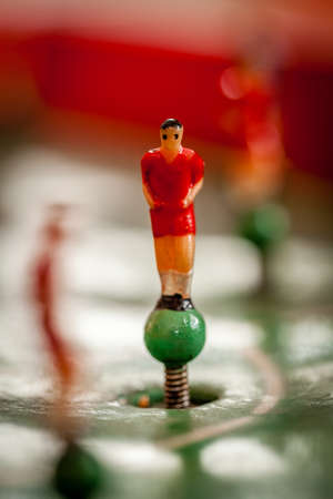 Close-up shot of red player of a tabletop football gameの写真素材